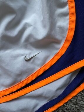 Nike White Shorts with Orange Trim and Navy Panels